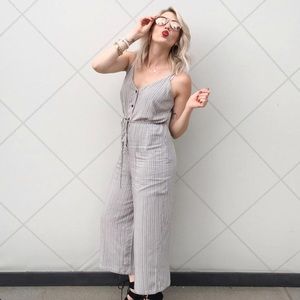 Pin stripes jump suit.